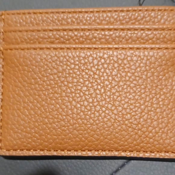 CALVIN KLEIN ID FLAT TAN BROWN LOGO WALLET
MEASURE - Picture 7 of 7